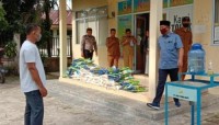 Diterima Penghulu Budiyanto, Dewan Siak Fairus SAg Kembali Salurkan Sembako Dampak C-19