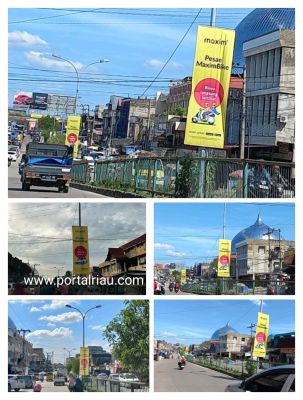 Diduga asal pasang Baliho Maxim,  Di tiang Penerangan Jalan Umum  Jalan Sudirman